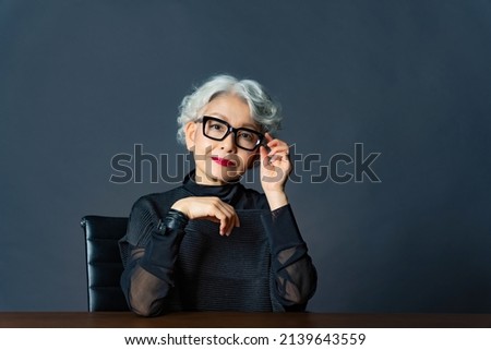 Portrait of elderly Asian woman. Stock photo © 