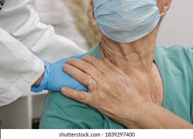 Portrait of elderly caucasian woman wearing protective medical mask. Care for the elderly people during corona virus outbreak, a helping hand, home care concept. - Powered by Shutterstock