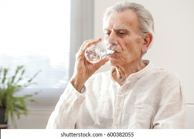 Portrait Elderly Man Drinking Water 