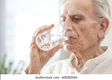 Portrait Elderly Man Drinking Water 