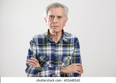 Portrait Elderly Man On Gray Background