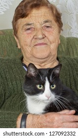 Portrait Elderly Woman And Cat