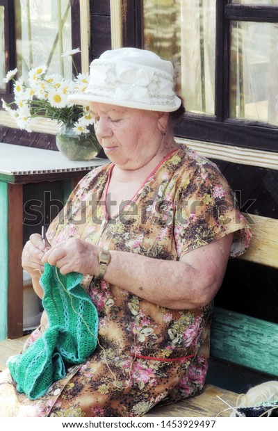 Portrait Elderly Woman Hat Knitting Needles Stock Photo Edit Now