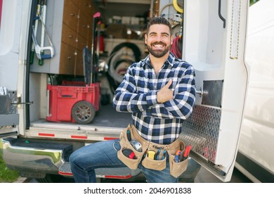 A Portrait of an electrician happy worker at work - Shutterstock ID 2046901838