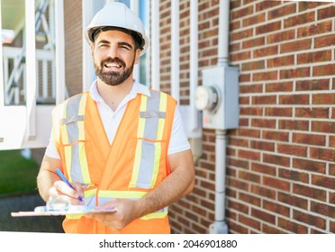 A Portrait Of An Electrician Happy Worker At Work