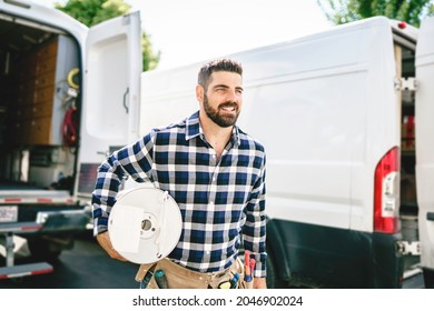 A Portrait Of An Electrician Happy Worker At Work