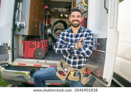 A Portrait of an electrician happy worker at work