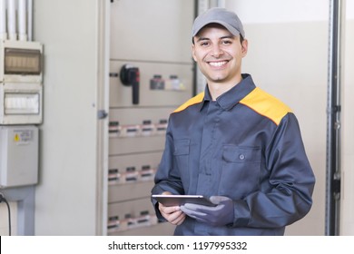 Portrait Of An Electrician At Work