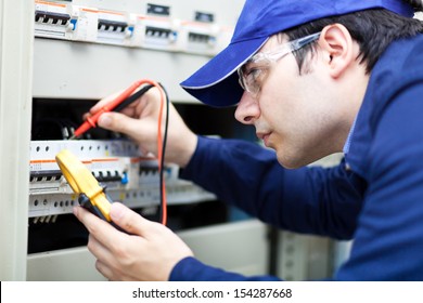 Portrait Of An Electrician At Work 