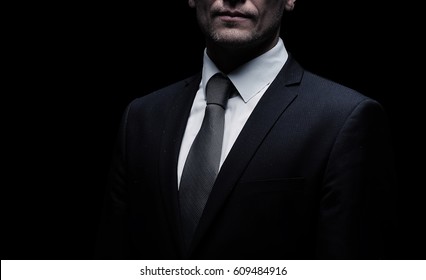 Portrait Of An Elegant Handsome Business Man Isolated On Black