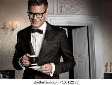 Portrait Of A Elegant Man With Cup Of Coffee