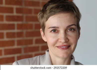 Portrait of an elegant woman with short hair