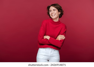 Portrait of emotional caucasian woman laughing and looking away isolated on red background. People emotions concept  - Powered by Shutterstock