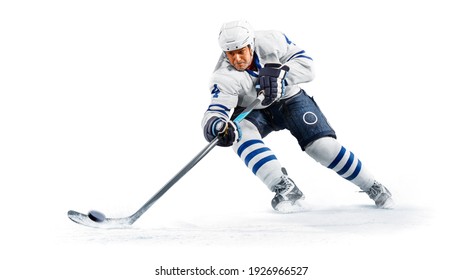 Portrait of energetic player playing hockey on ice