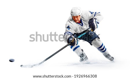 Portrait of energetic player playing hockey on ice