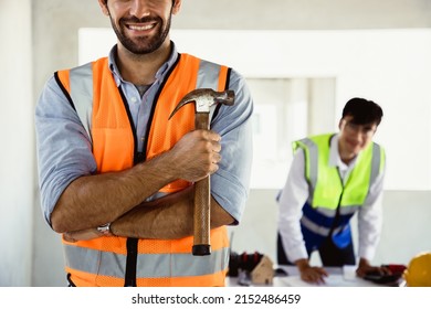 Portrait Of Engineer Diversity Teamwork Checking And Maintenance House In Property Projects Via Hammer Before Delivered To The Homeowner. Concept Of Construction And Inspection Work