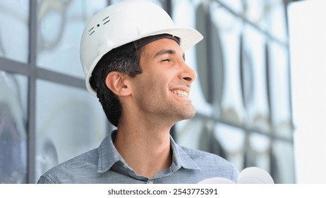 Portrait of an engineer in a hard hat posing for the camera - Powered by Shutterstock - Get 15% off with code: PIKWIZARD15