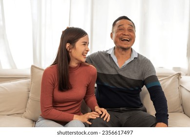 Portrait of enjoy happy love asian family senior mature father and young daughter smiling play laughing and having fun together at home, care, elderly, insurance.happy family and Father Day concept - Powered by Shutterstock