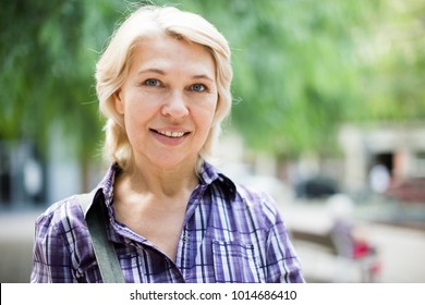 portrait of European elderly blonde woman - Shutterstock ID 1014686410