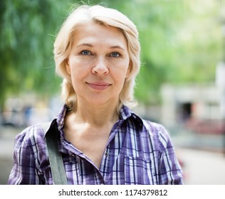 portrait of European elderly blonde woman - Shutterstock ID 1174379812