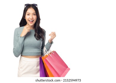 Portrait excited beautiful woman wearing sunglasses hold shopping bags isolated on white background and copy space Surprise happy asian woman open mouth with excited Beauty young female love shopping - Shutterstock ID 2152594973