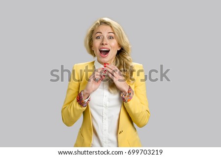 Similar – Image, Stock Photo Amazed woman, she expresses WOW. Impressed lady on yellow background. Great news