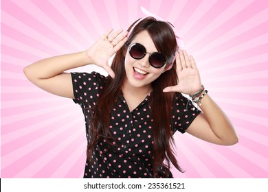 Portrait Of Excited Happy Young Girl Smiling In Pink Polkadot Shirt