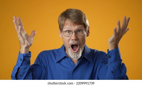 Portrait Of Excited Jubilant Overjoyed Elderly Bearded Man 50s 60s Doing Winner Gesture Celebrate Clenching Fists Say Yes Isolated On Solid Yellow Background Studio