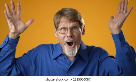 Portrait Of Excited Jubilant Overjoyed Elderly Bearded Man 50s 60s Doing Winner Gesture Celebrate Clenching Fists Say Yes Isolated On Solid Yellow Background Studio