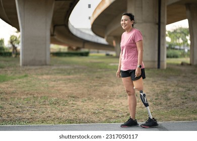 Portrait exercise woman with prosthetic leg in the park	 - Powered by Shutterstock