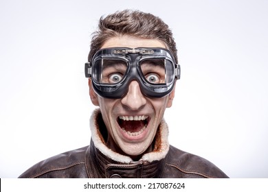 Portrait Of Exited Funny Man In The Pilot Goggles.