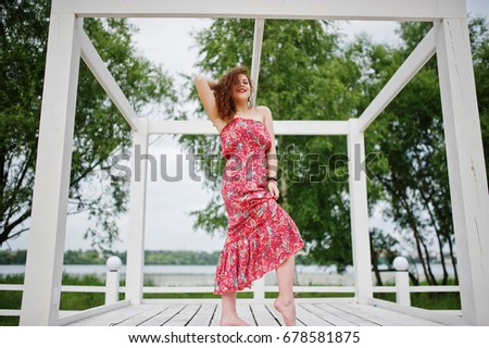 Similar – Woman in front of a yellow beach house