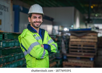 Portrait Of Factory Warehouse Foreman And Supervisor In Front Of Wearhouse Pallets Storage