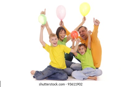 Portrait Of A Family With Baloons On White