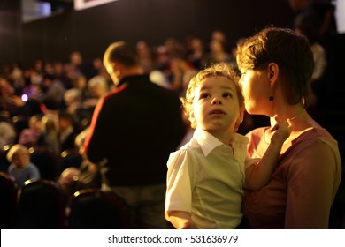 Portrait Of Family At A Concert In The Evening