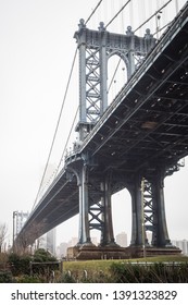 Portrait Of The Famous Manhattan Bridge From Plymouth Street In The Streets Of Brooklyn, New York