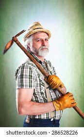 Portrait Of Farmer With His Mattock