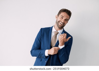 Portrait, fashion and happy man in suit for wedding event, marriage ceremony or laugh in studio. Face, smile or groom in stylish formal clothes to prepare for party on white background space in Spain - Powered by Shutterstock