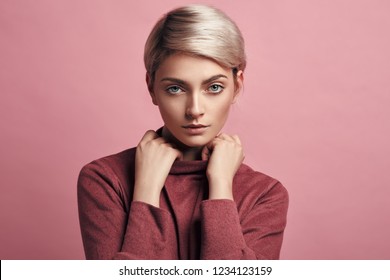 Portrait of fashion woman with blond short hair