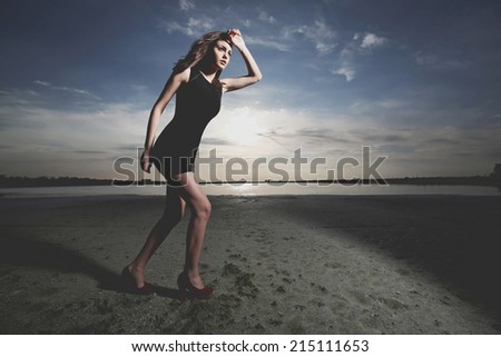 Similar – Young woman walks on the beach