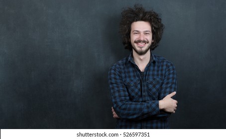 Portrait Of A Fashionable Young Man With Funny Hair On Dark Background, Chalkboard Copyspace