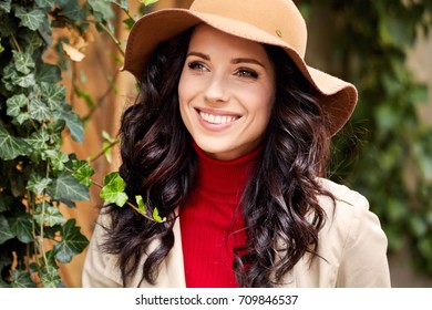 Portrait Of Fashionably Dressed Woman In Autumn Hat. Beauty Concept