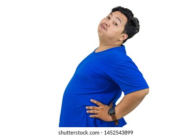 Portrait of fat overweight obese man in blue shirt holding his big belly isolated on white background, Diet Concept