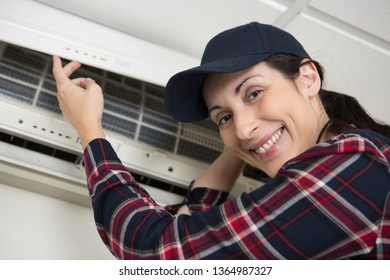 Portrait Of A Female Air Conditioning Engineer