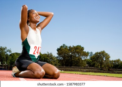 Portrait Of A Female Athlete Celebrating Her Win