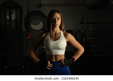 Portrait Of Female Athlete Looking At Camera In Gym