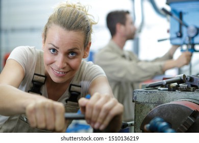 Portrait Of Female Blacksmith Smiling