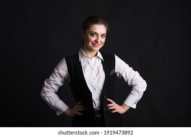 Portrait of a female business lady in the studio on a black background