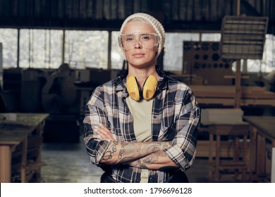 Portrait Of Female Carpenter Wearing Protective Eyewear