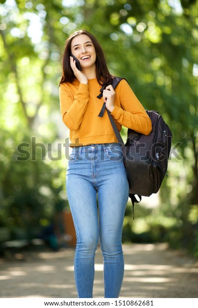 Portrait Female College Student Walking Through Stock Photo (Edit Now